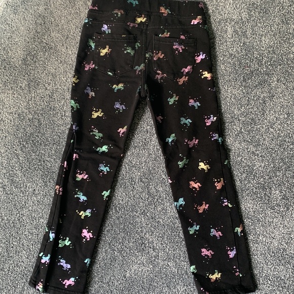 Girls black pants with colorful sparkly unicorn pattern. Size 6. Brand H&M. - Picture 4 of 6